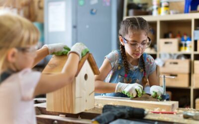 kids putting together a homemade bird house